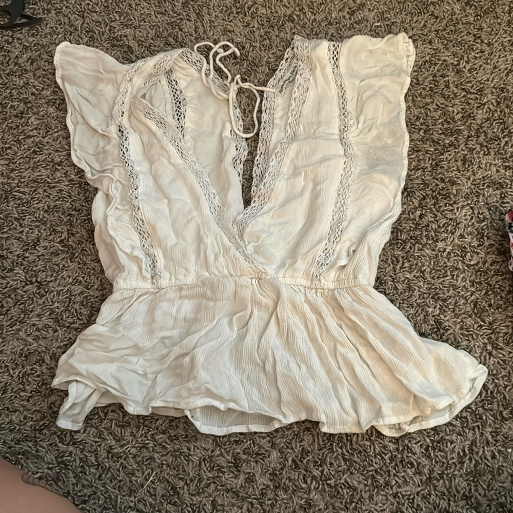 low cut peplum blouse